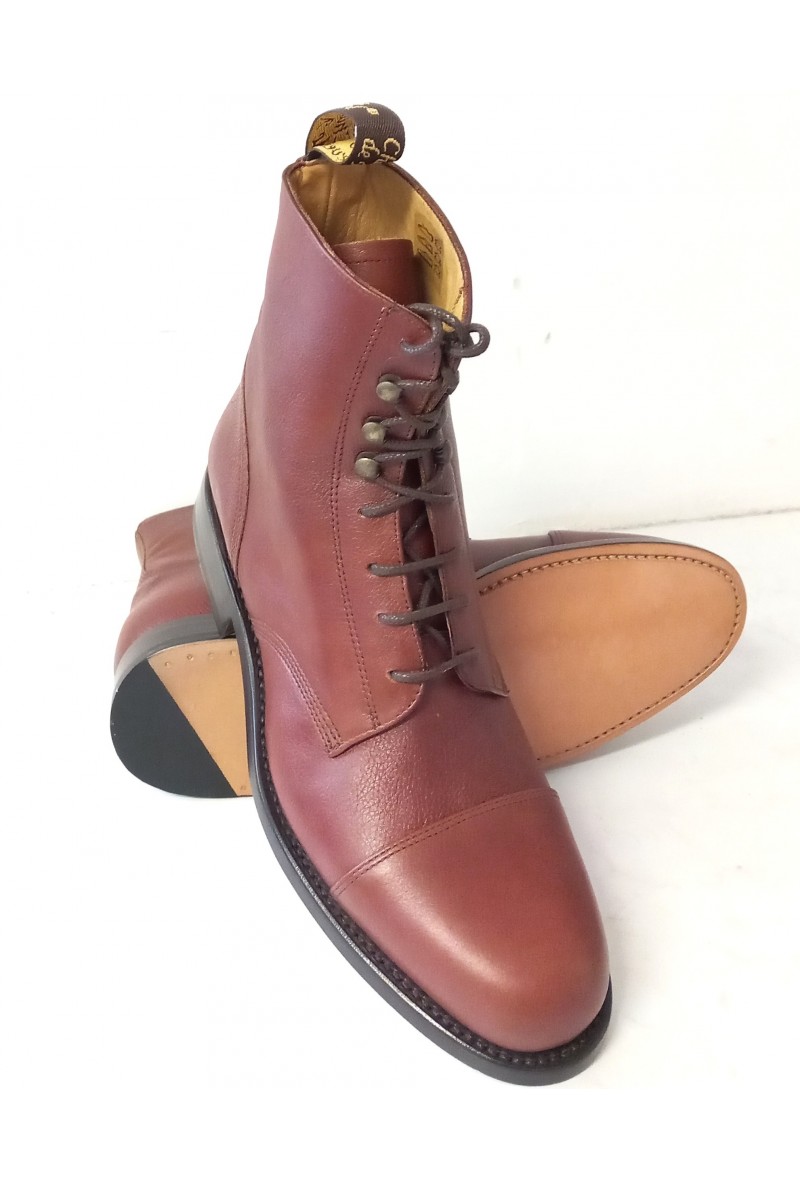 Marque de chaussure avec une fleur sous la semelle online